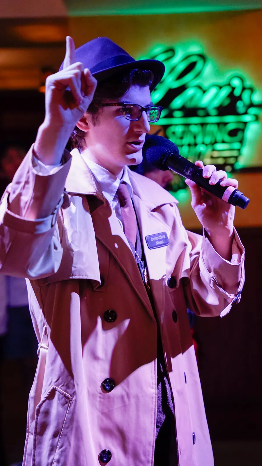 A Murder Mystery Company actor working the room at a Manchester show